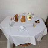 Rattan table and smoked glass