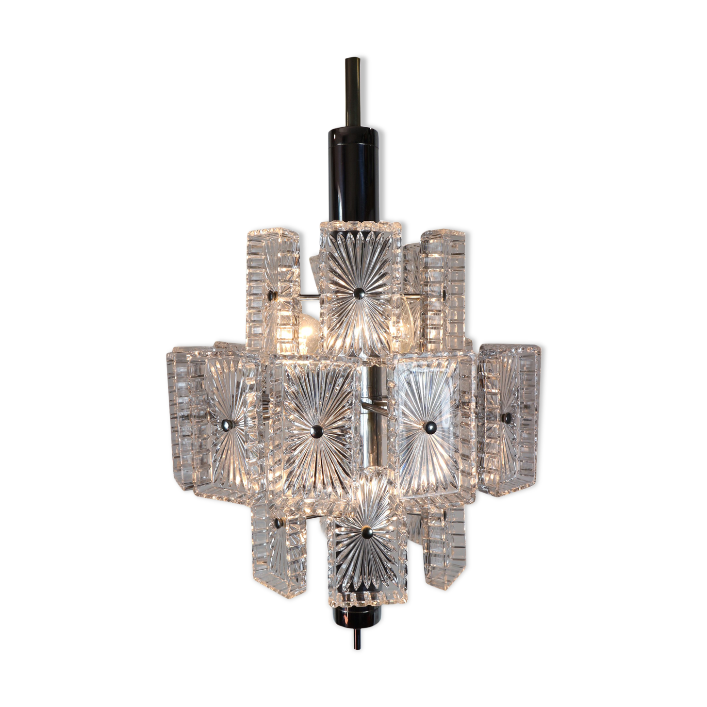 Vintage metal chandelier and carved glass