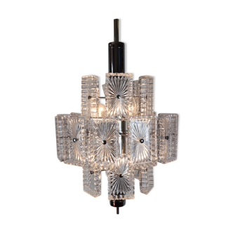 Vintage metal chandelier and carved glass