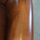 Sheepskin armchair/lounge chair finished with decorative nailheads