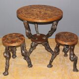 Pedestal table and its brutalist stools in vine stock around 1950