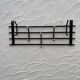 Iron and brass coat rack