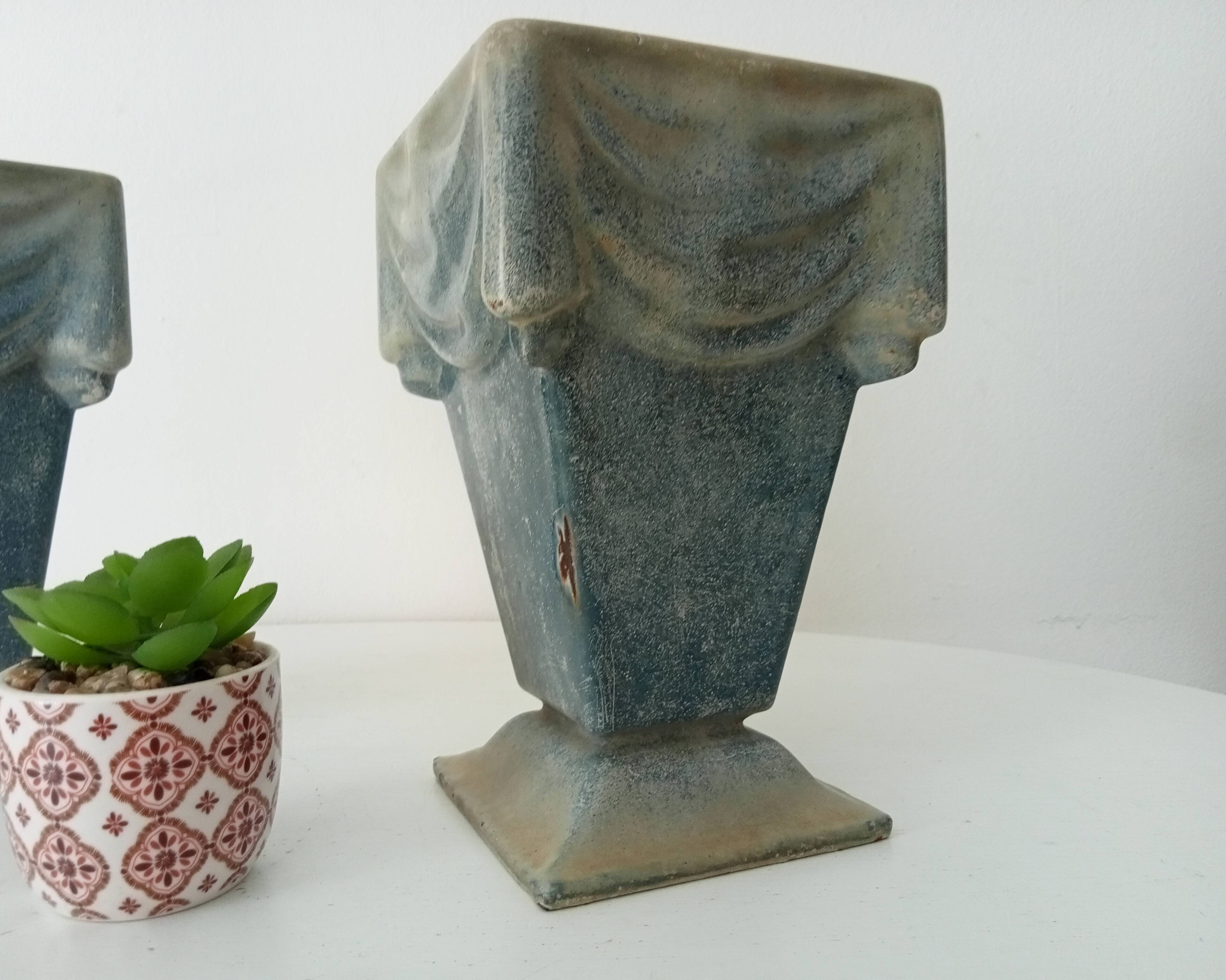 Pair of old art deco vases in enameled cast iron
