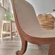 Vintage gondola armchair in beige linen fabric.
