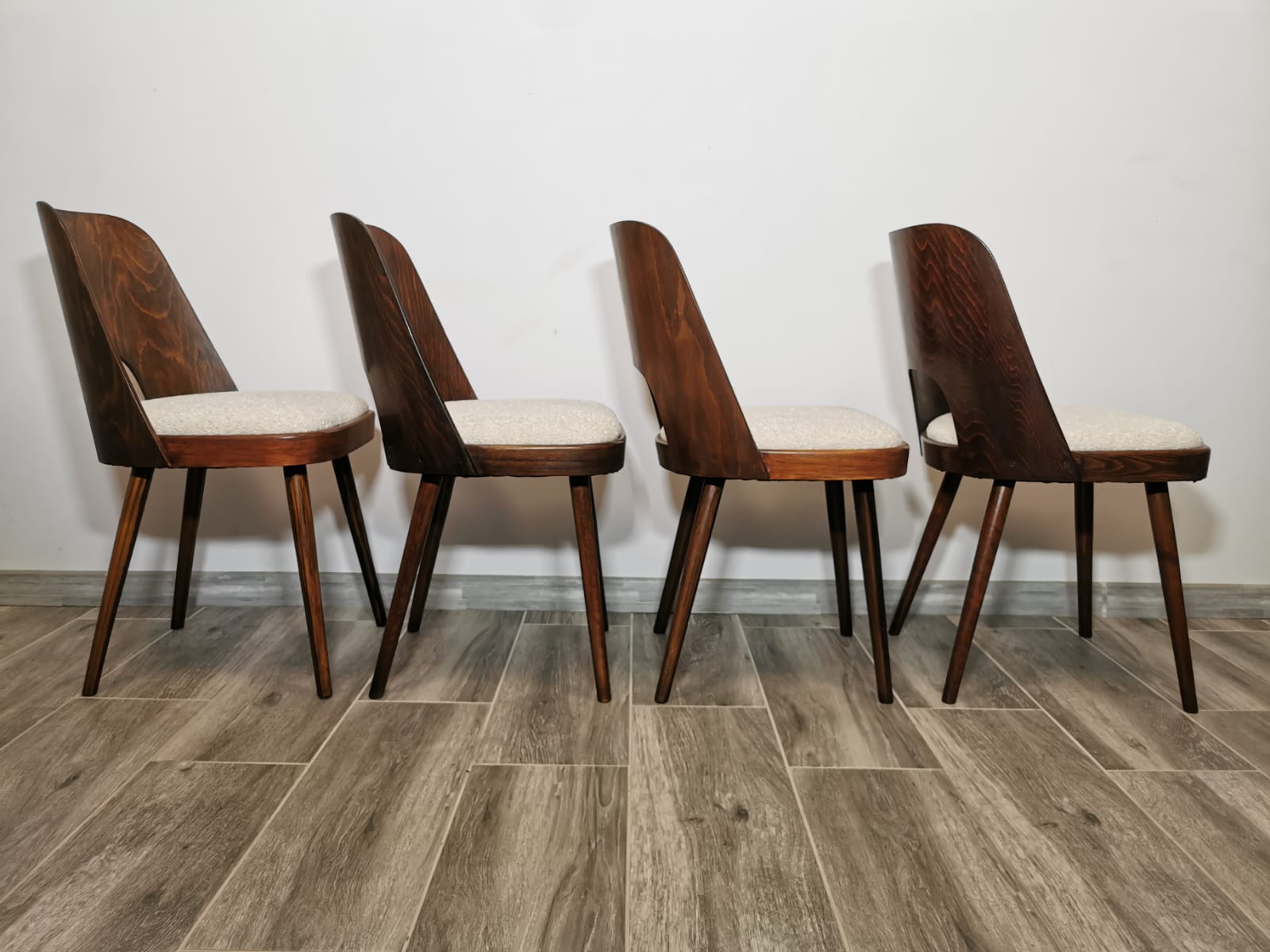 Dining chairs by Oswald Haerdtl