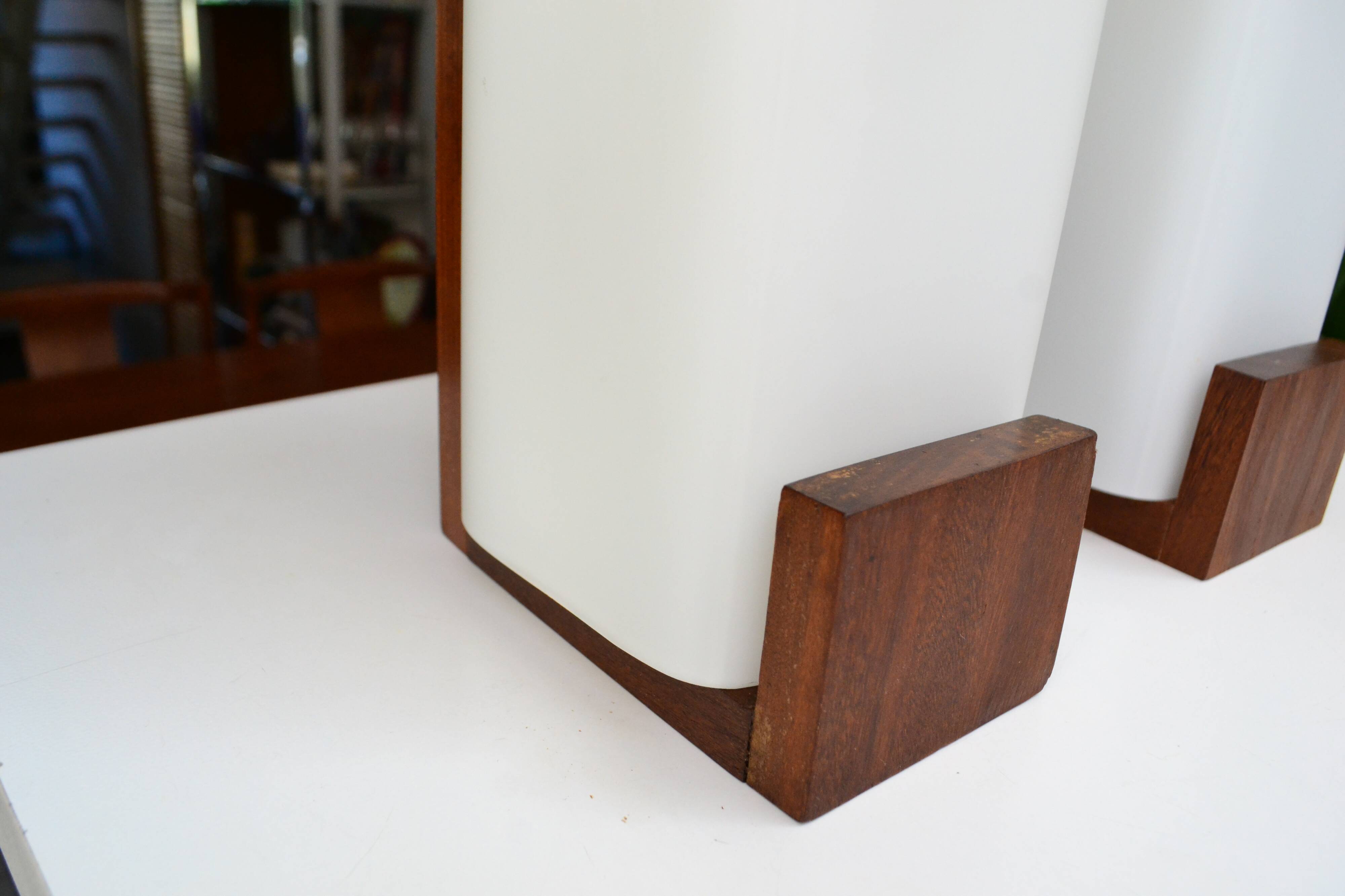 Pair of Louis Kalff opaline and teak wall lights from the 1950s/60s