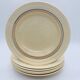 6 deep plates with fine blue and brown rim decorations.