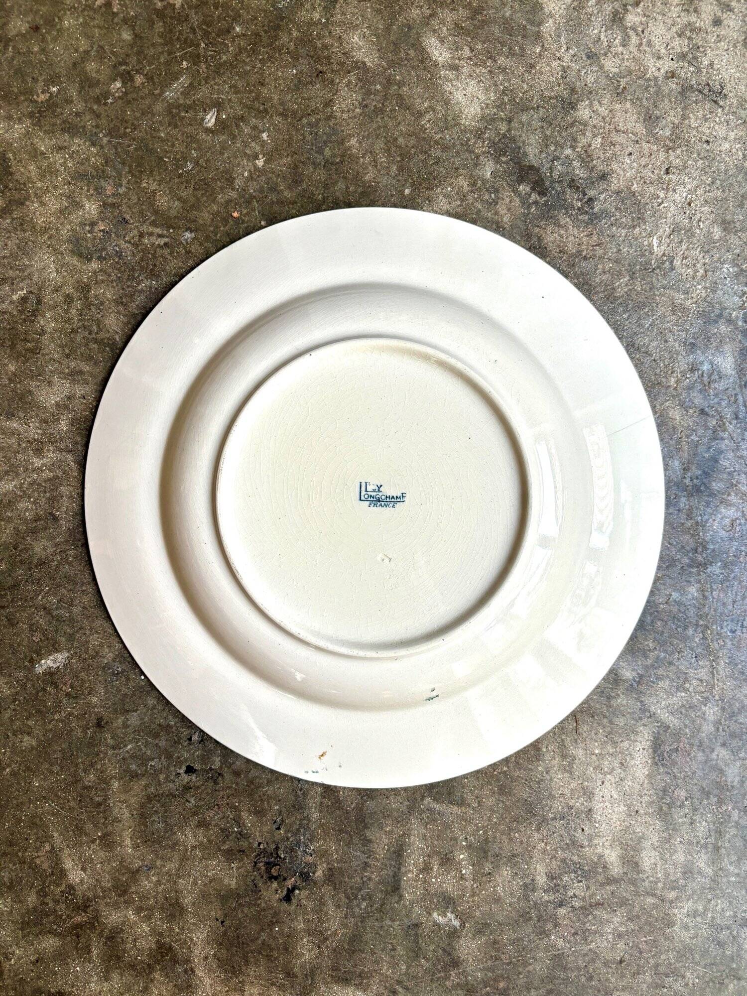 Longchamp hollow round dish in iron earth, "Lily" service