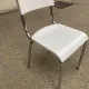 Space age chair with chrome metal and white schoolboy shell, desk 1970.