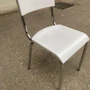 Space age chair with chrome metal and white schoolboy shell, desk 1970.