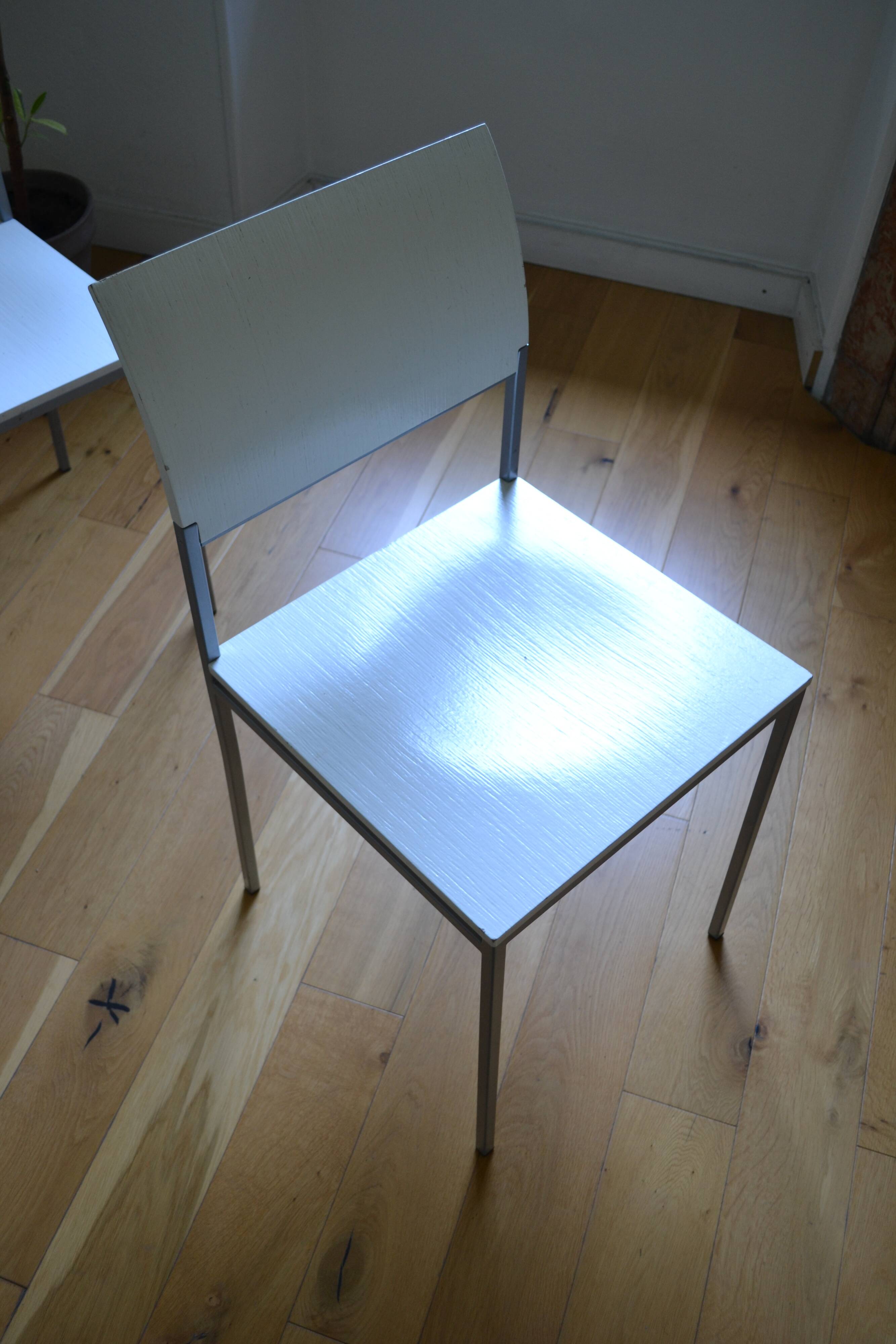 Set of 4 vintage metal and wood chairs from the 1990s.