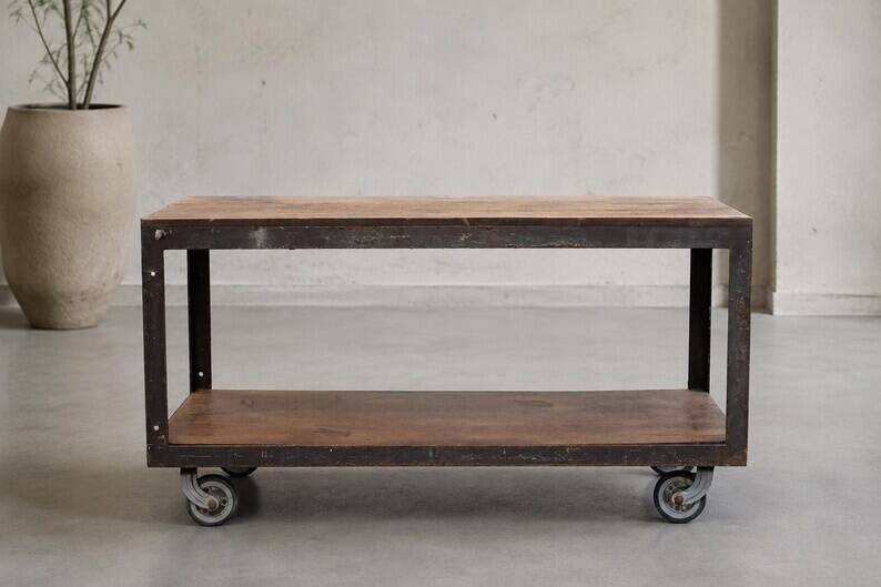 Industrial coffee table in metal and wood, wheeled table, trolley, vintage table, interior decoration.