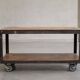 Industrial coffee table in metal and wood, wheeled table, trolley, vintage table, interior decoration.