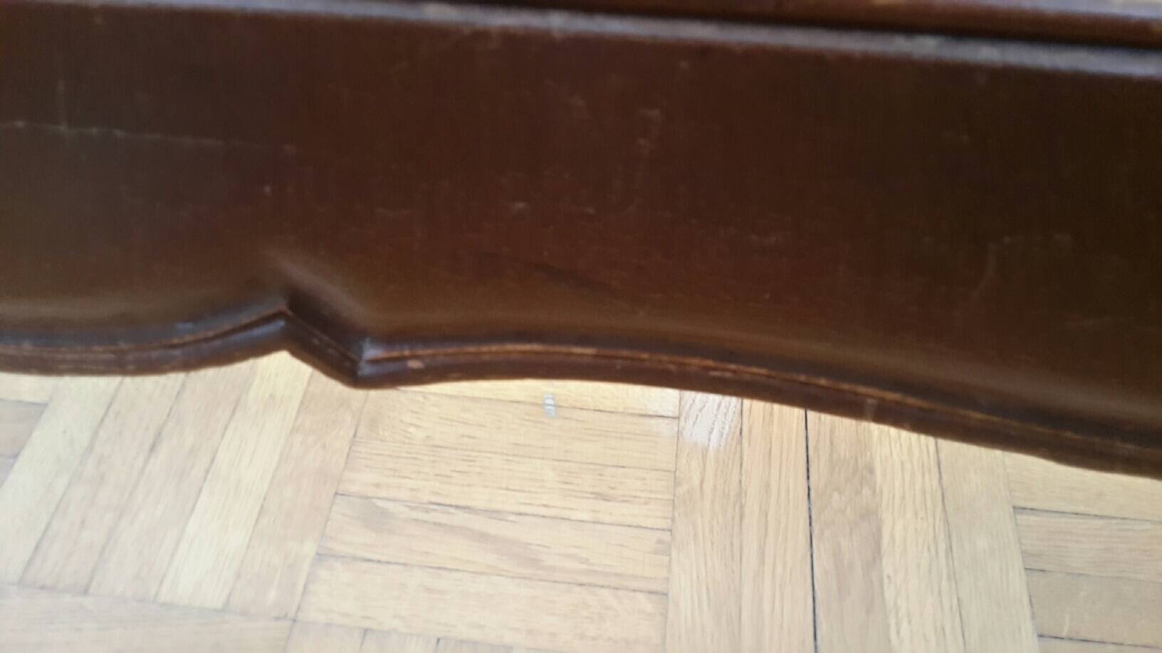 Cabinetmaker's bed frame and matching upholstered bedspread