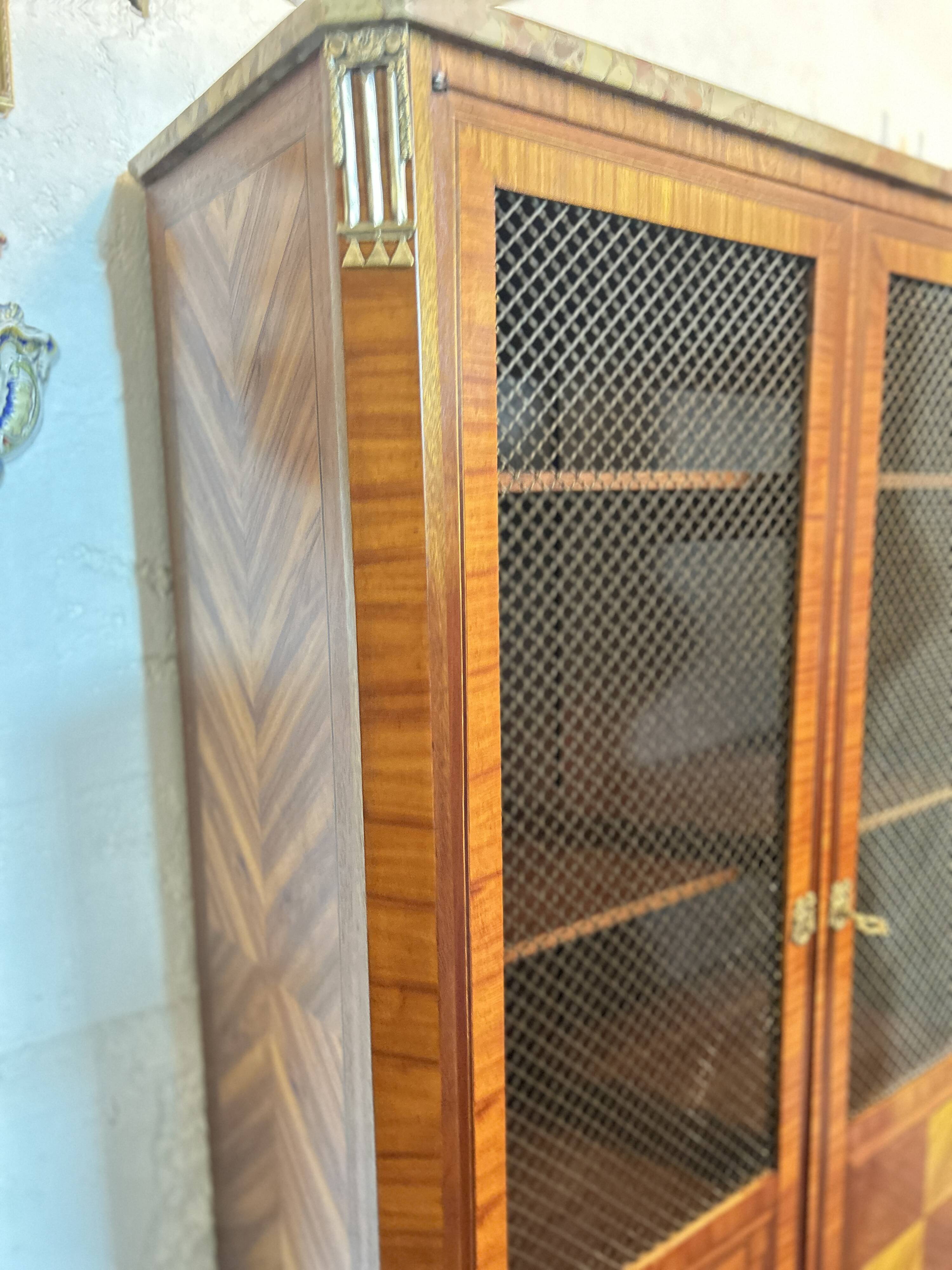 Directoire style display cabinet with two doors