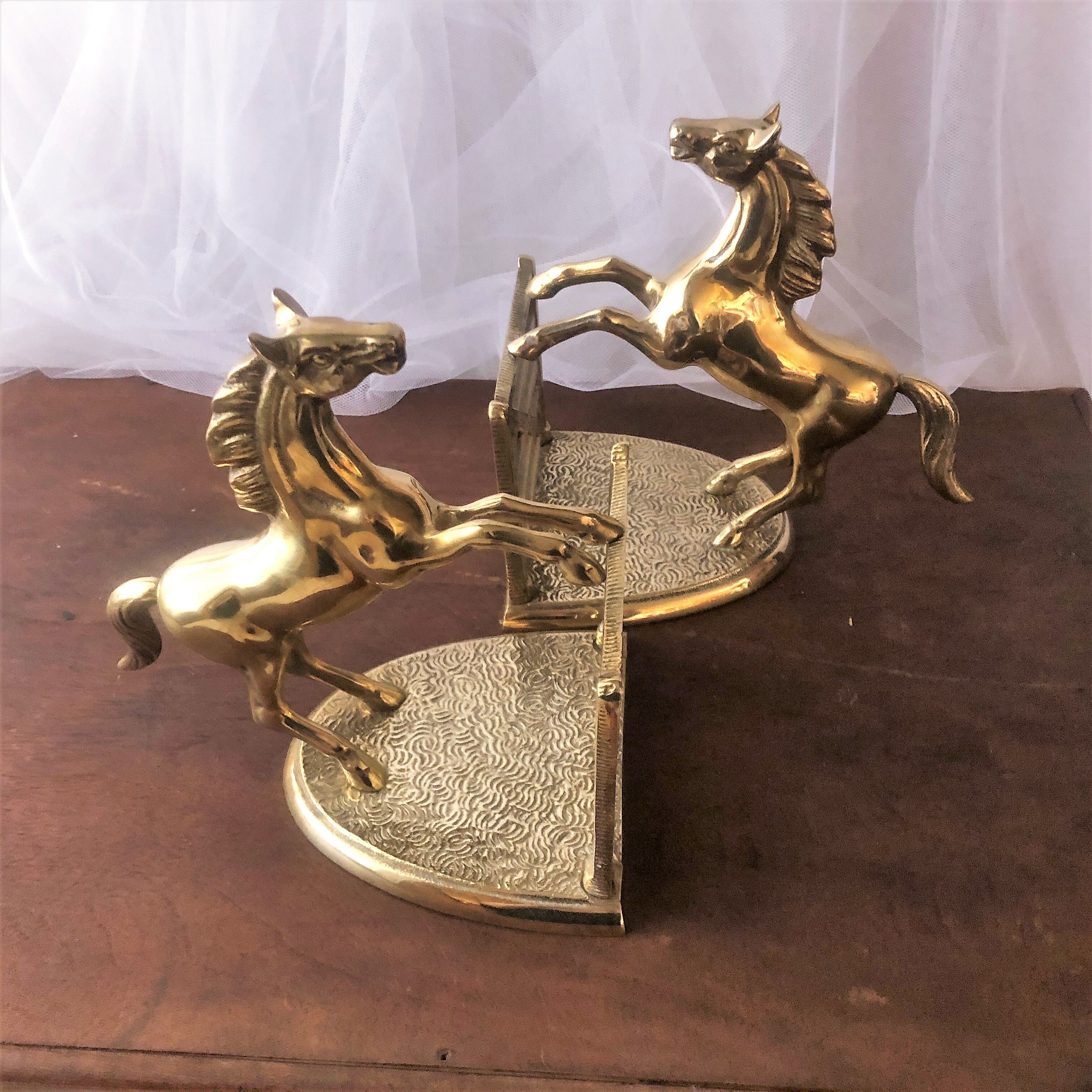 Goldeneye brass décor horses