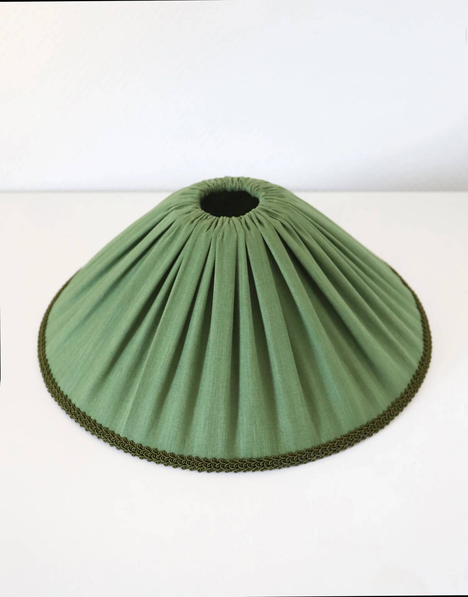 Recycled vintage lamp — spindle wooden base, pleated green linen shade