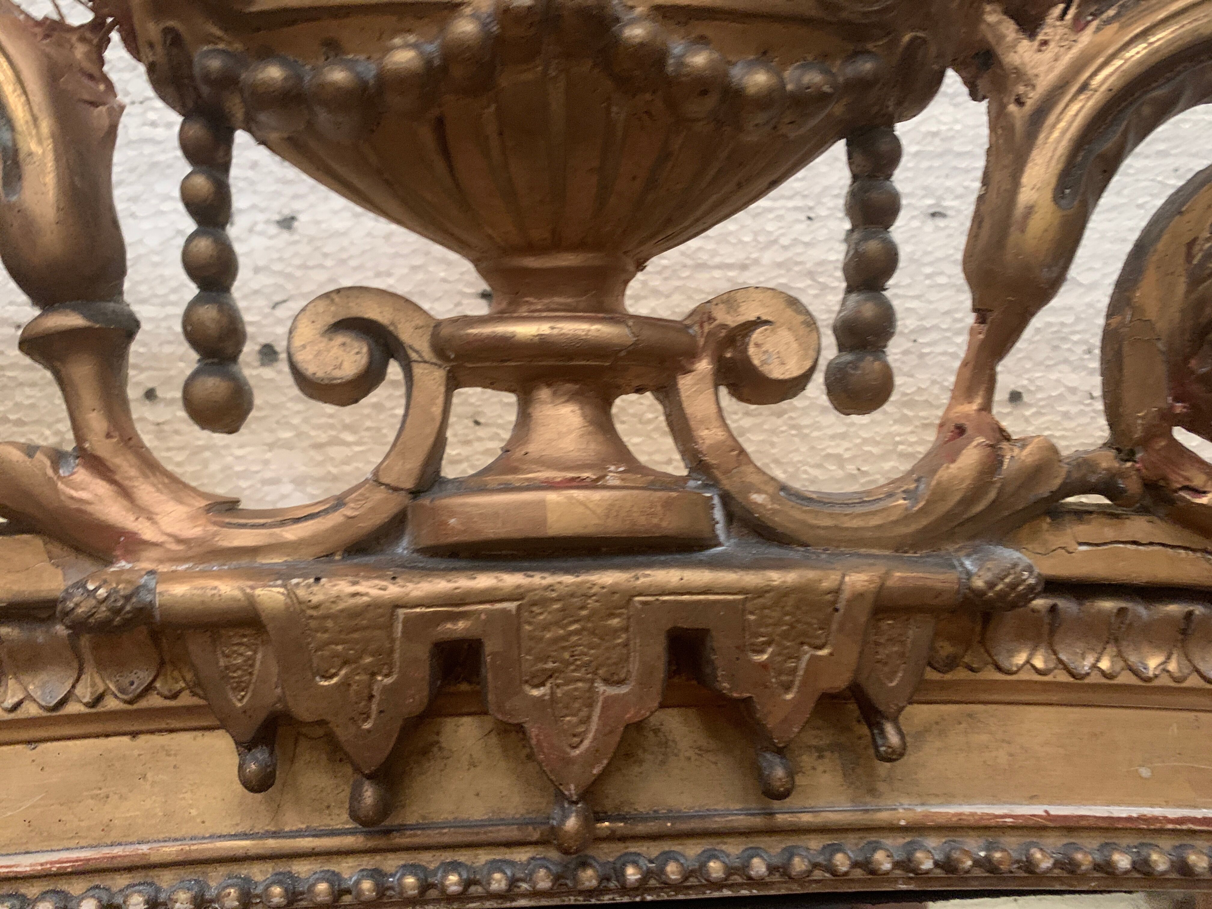 Louis XVI style mirror in wood and gilded stucco XIX century