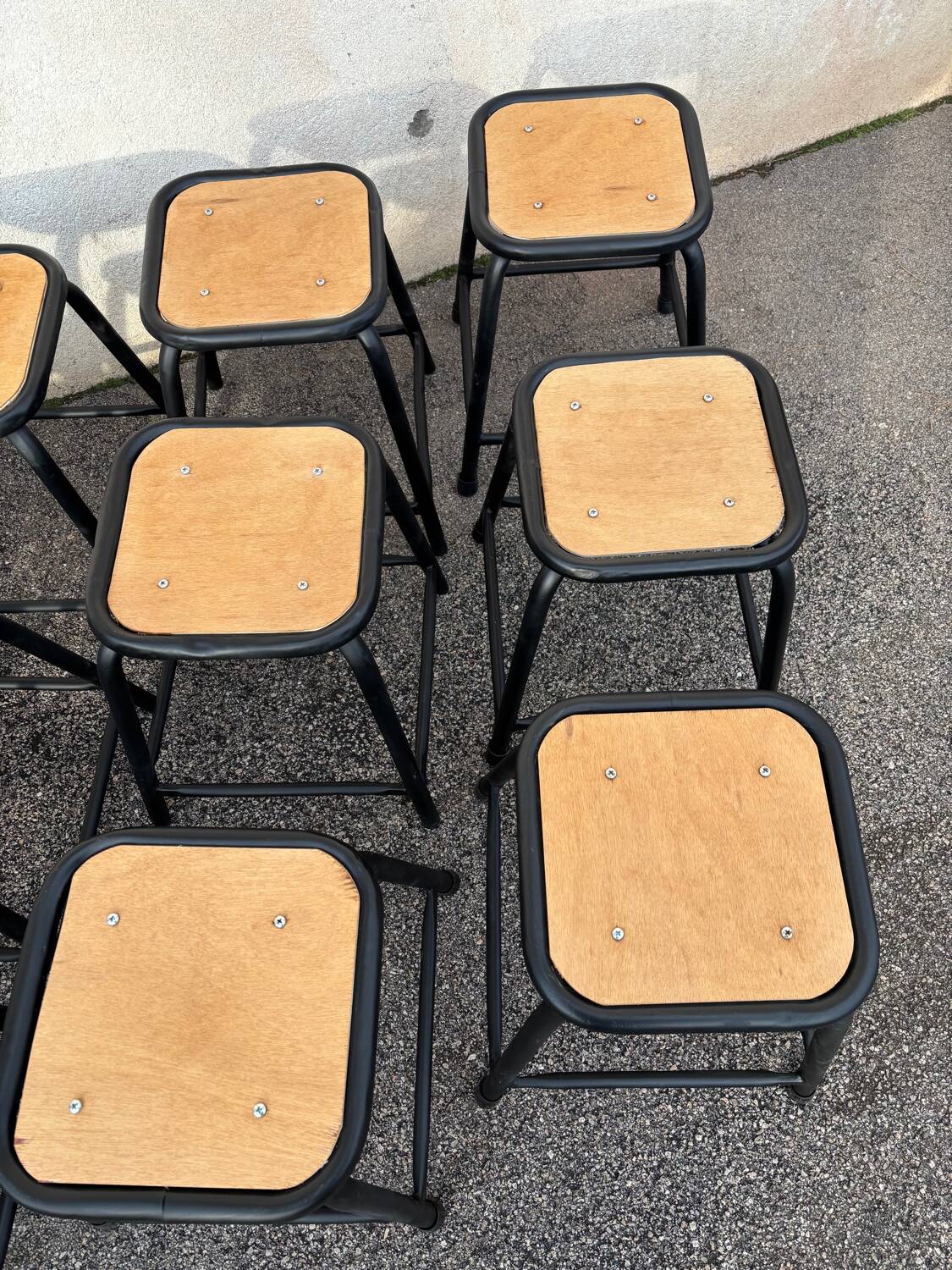 Set of 12 black industrial stools