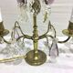Paire de lampes girandoles en bronze et cristal