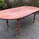 Antique cherry wood farmhouse table with rounded ends