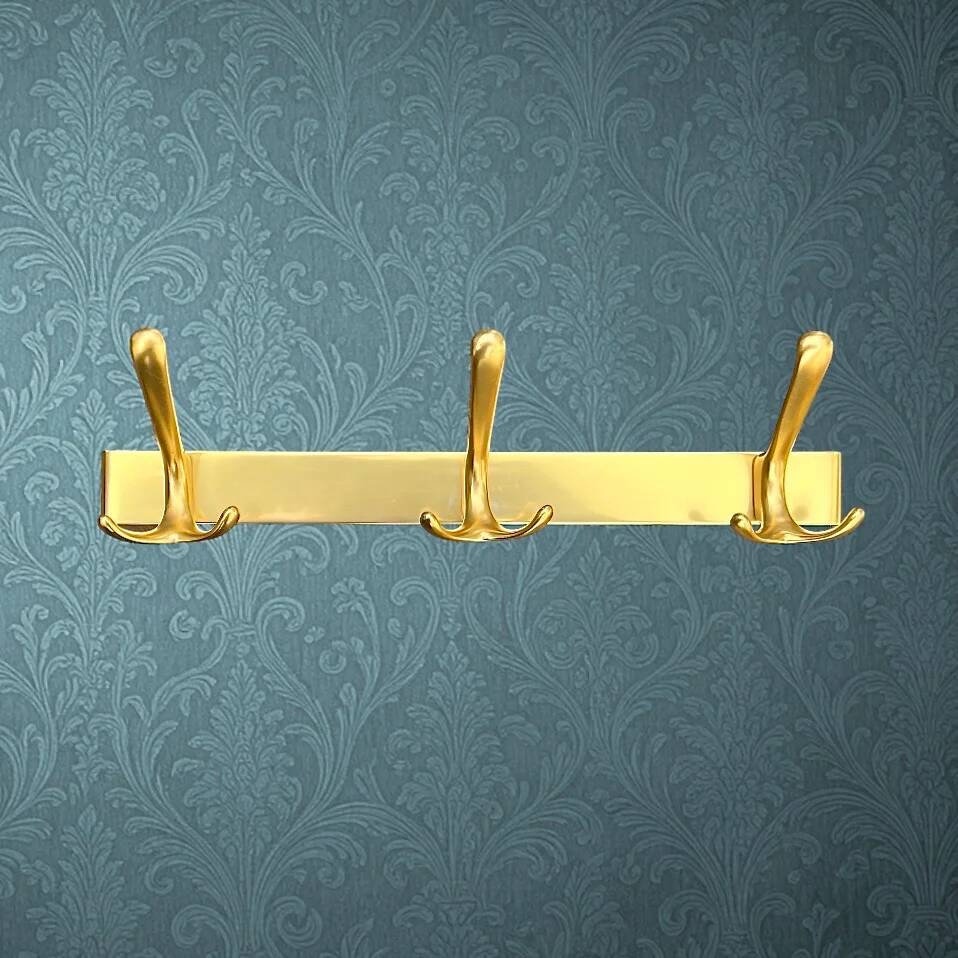 Vintage wall-mounted coat rack in anodised gold aluminium with 3 hooks from the 1970s.