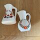 2 pots à lait décor floral (hauteur 9,5 cm )