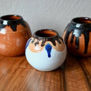 Set of three ethnic glazed terracotta ball vases from the 1970s.