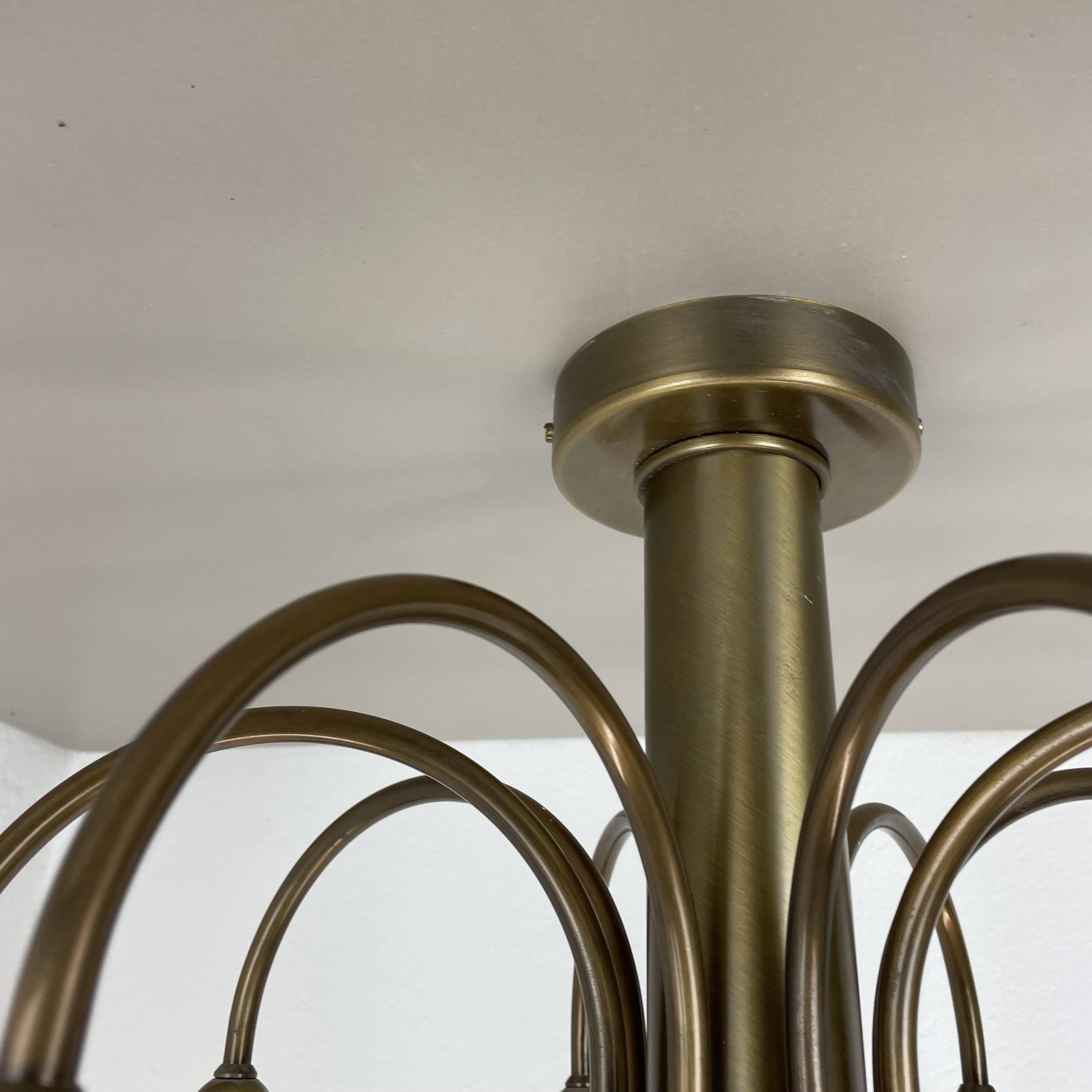 large 12-armed solid Brass ceiling light Chandelier by WKR Lights, Germany 1970s