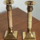 Pair of brass and stone candlesticks