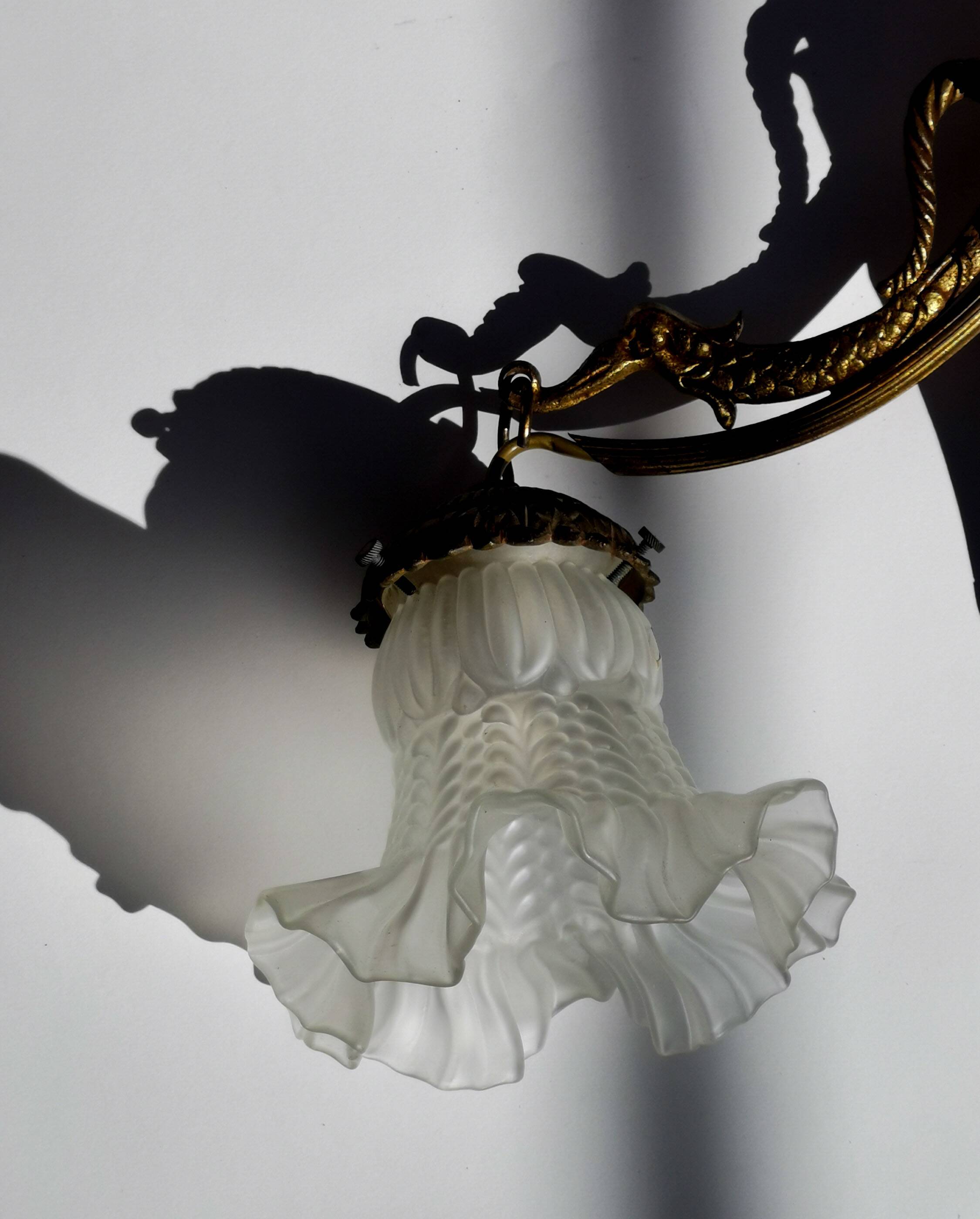 Antique bronze wall light