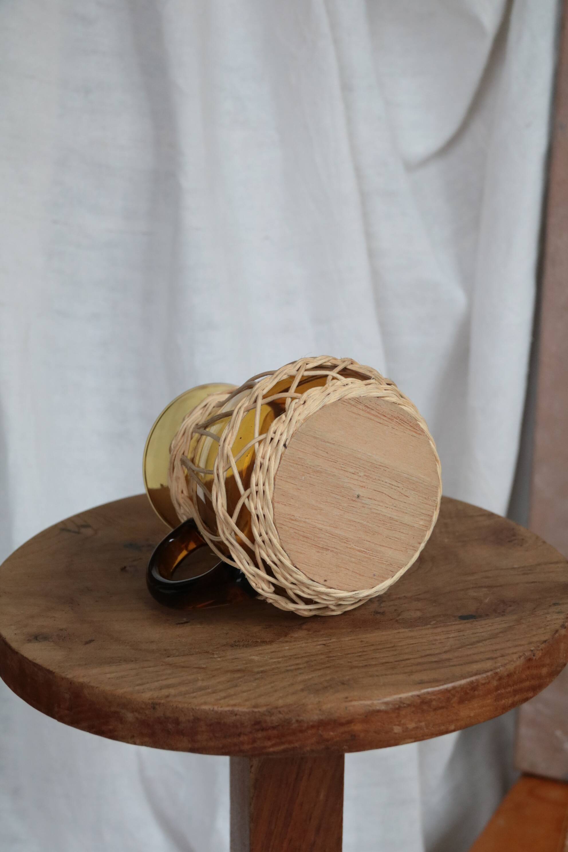 Amber glass and wicker carafe