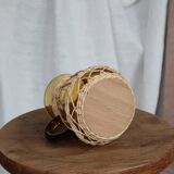 Amber glass and wicker carafe