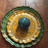 Two Florentine round table tops.