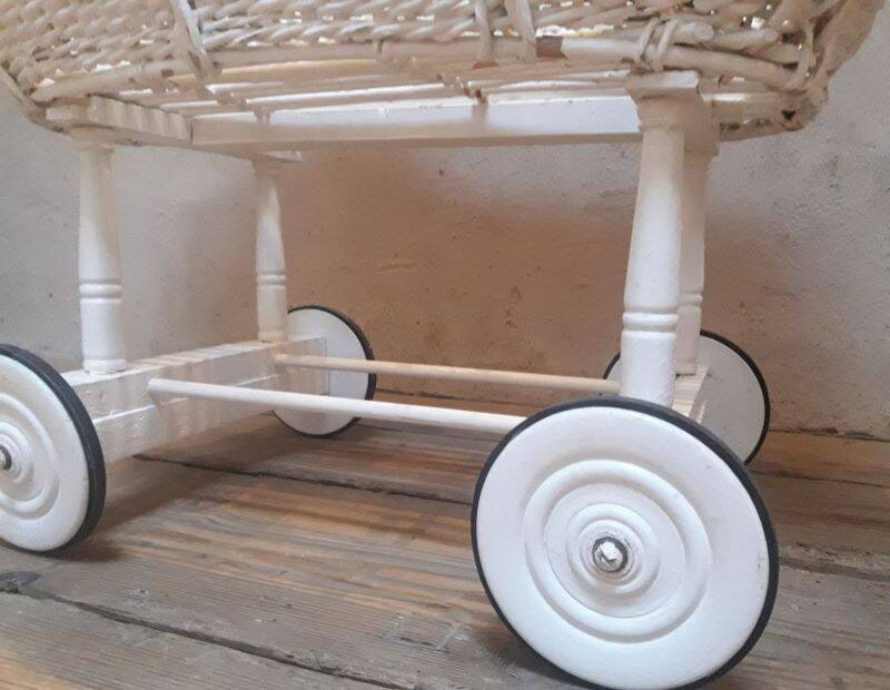 Wicker and painted wood baby cradle