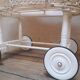 Wicker and painted wood baby cradle