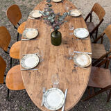 Oval solid wood dining table