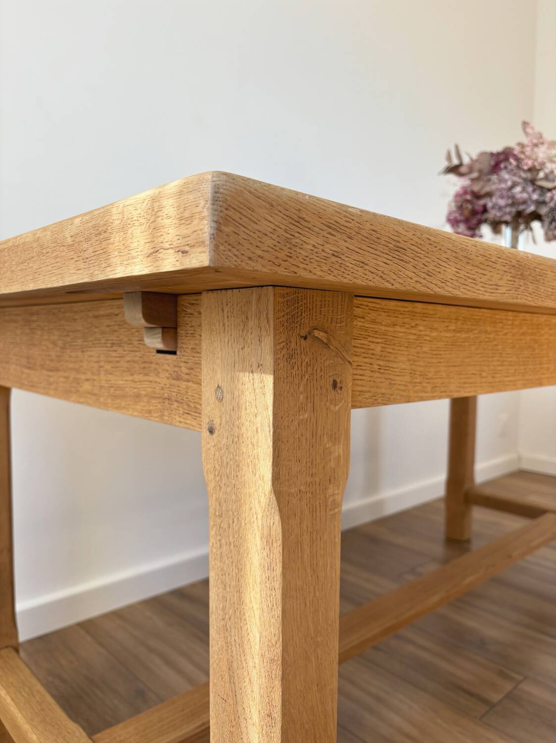 Solid oak farmhouse table with extensions.