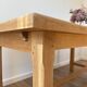 Solid oak farmhouse table with extensions.