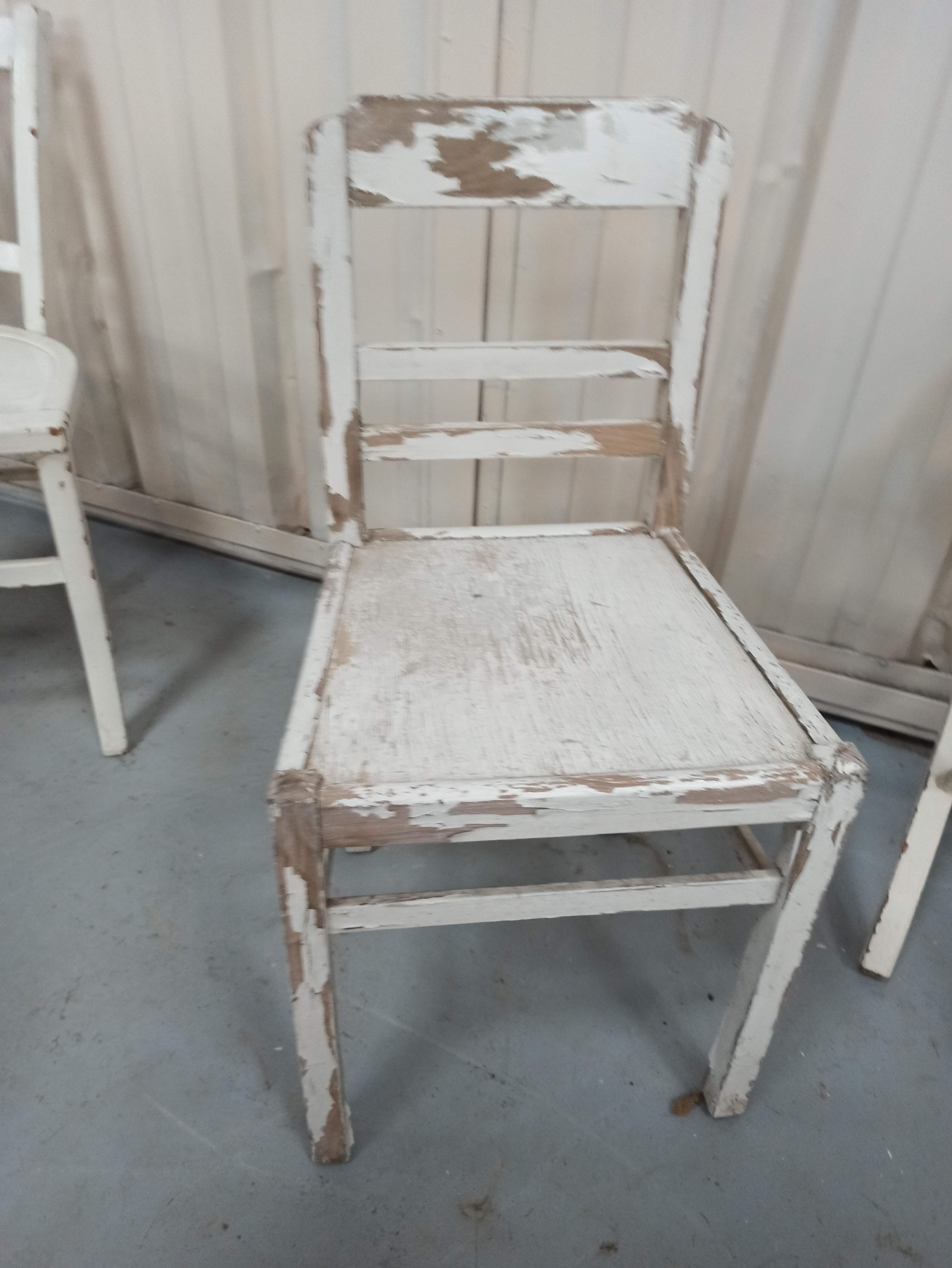4 patinated white bistro chairs