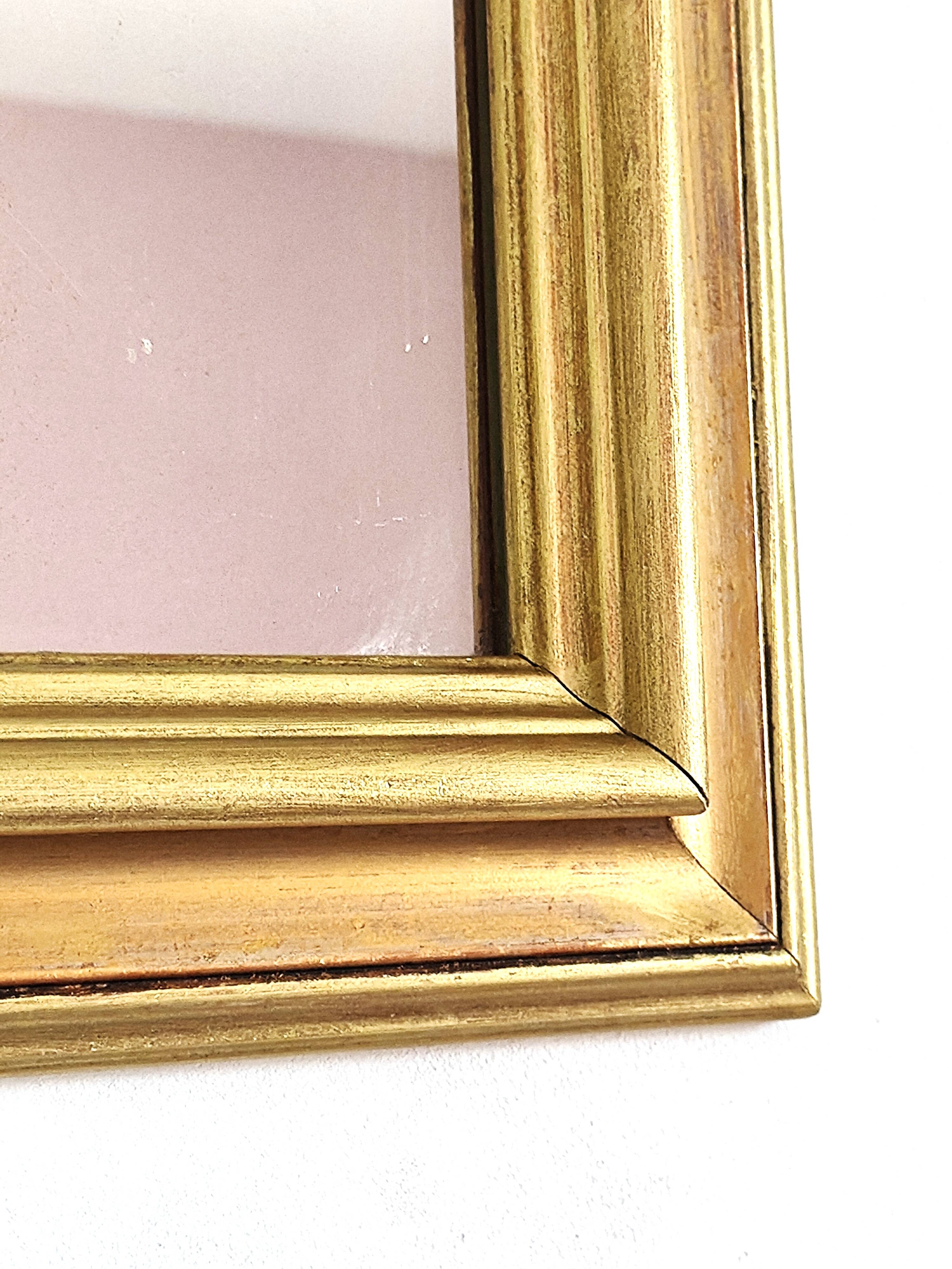 Miroir ancien en bois doré et cuivré