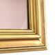 Miroir ancien en bois doré et cuivré