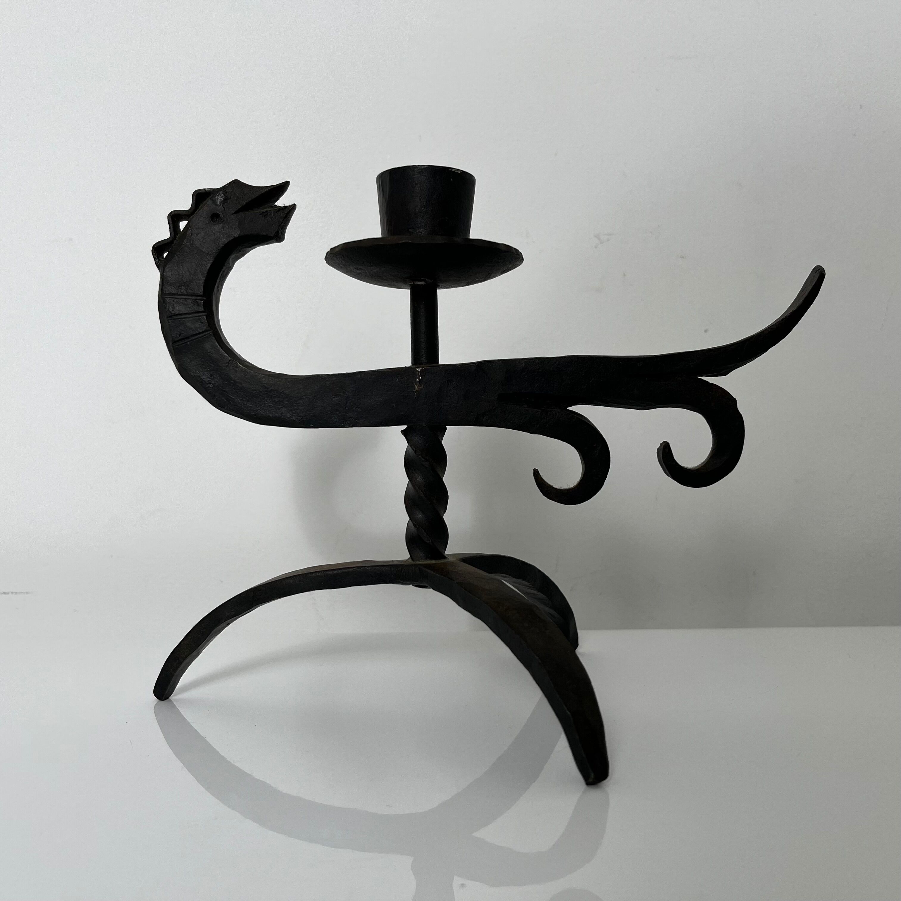 Zoomorphic dragon candle holder in wrought iron