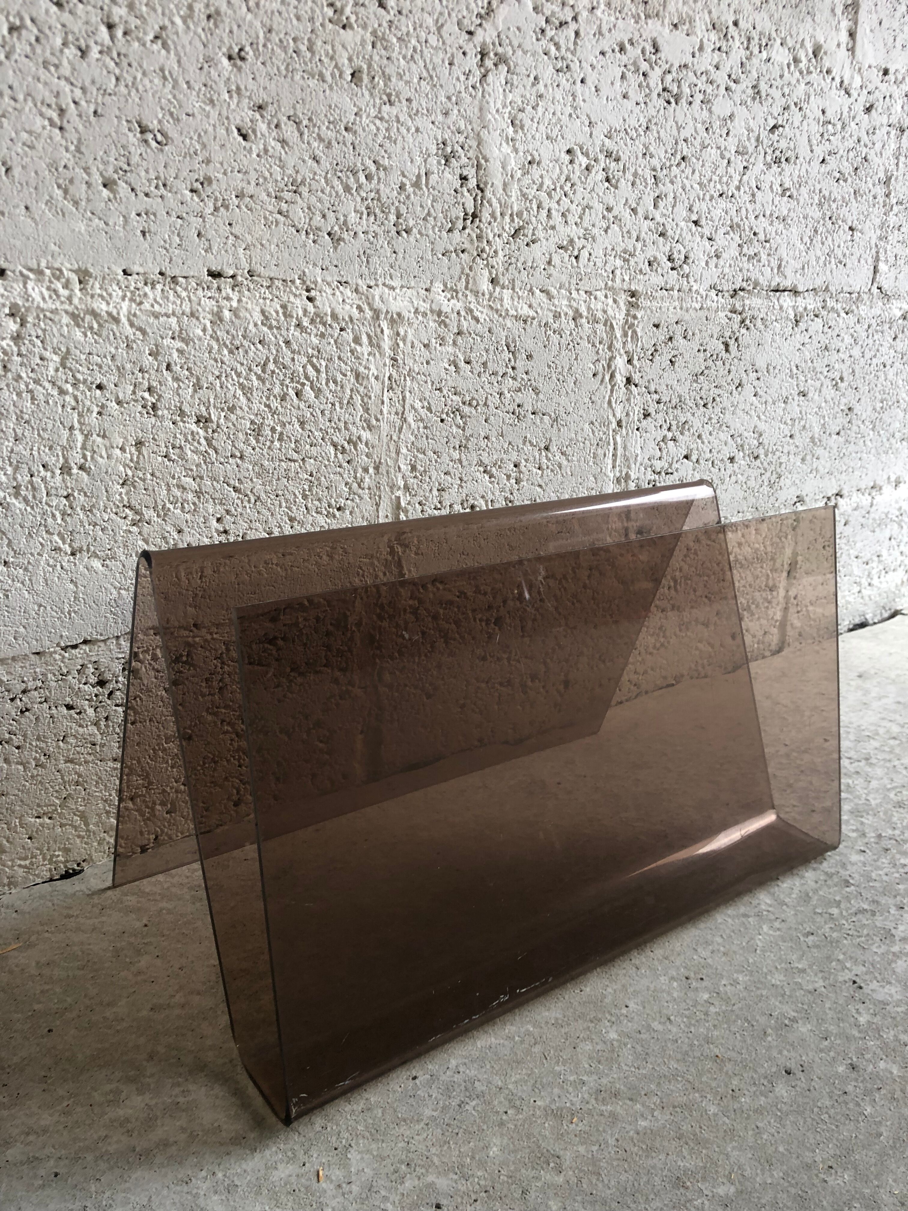 Magazine holders in altuglas 70s