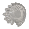 Empty crystal pocket in the shape of a shell