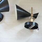 Pair of dialog-form sconces