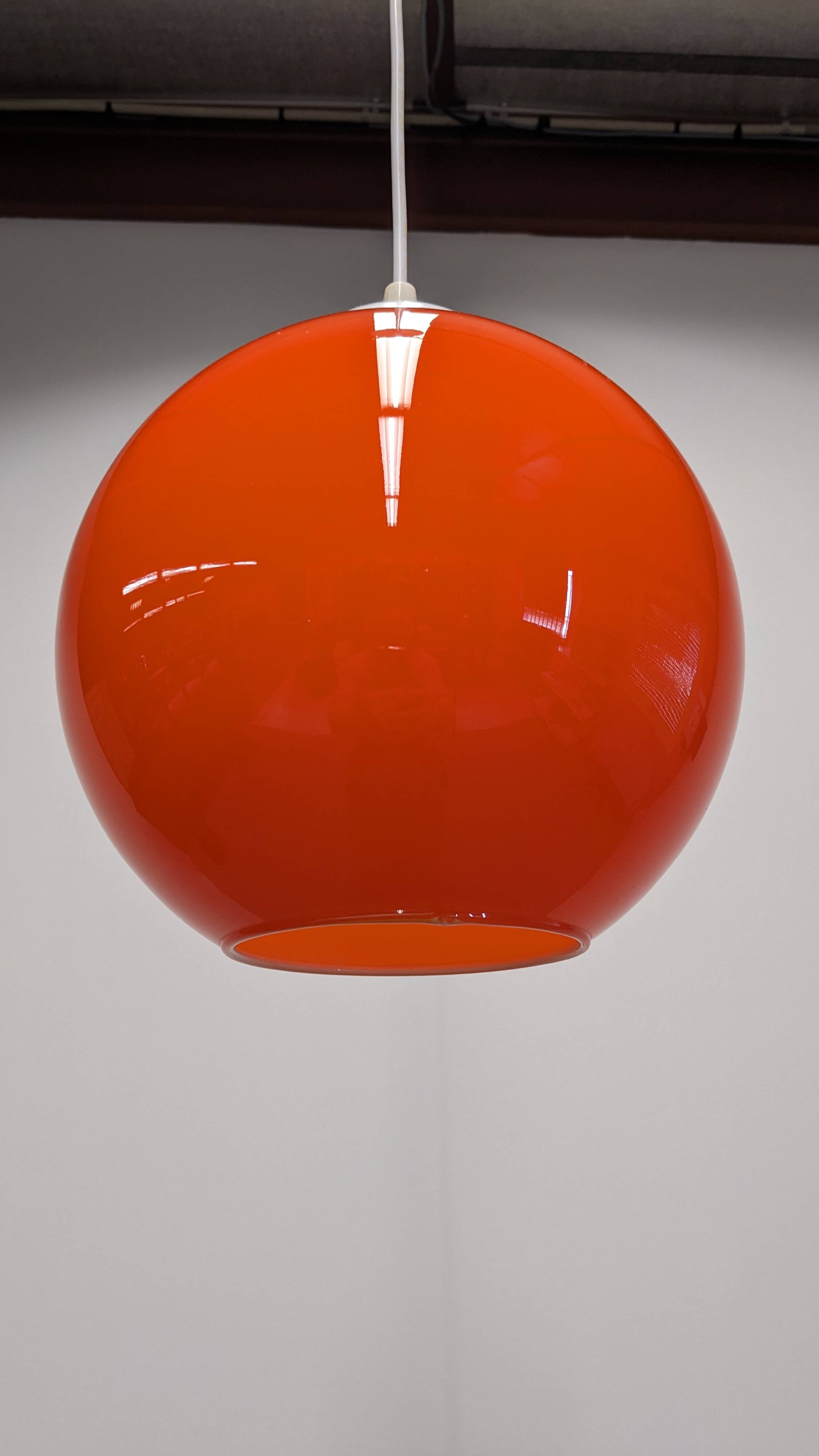 Orange opaline ball pendant, France circa 1970.