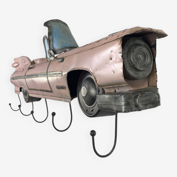 Pink Cadillac coat rack in sheet metal