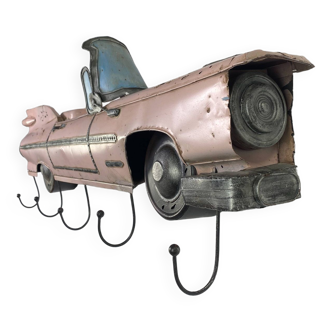 Pink Cadillac coat rack in sheet metal