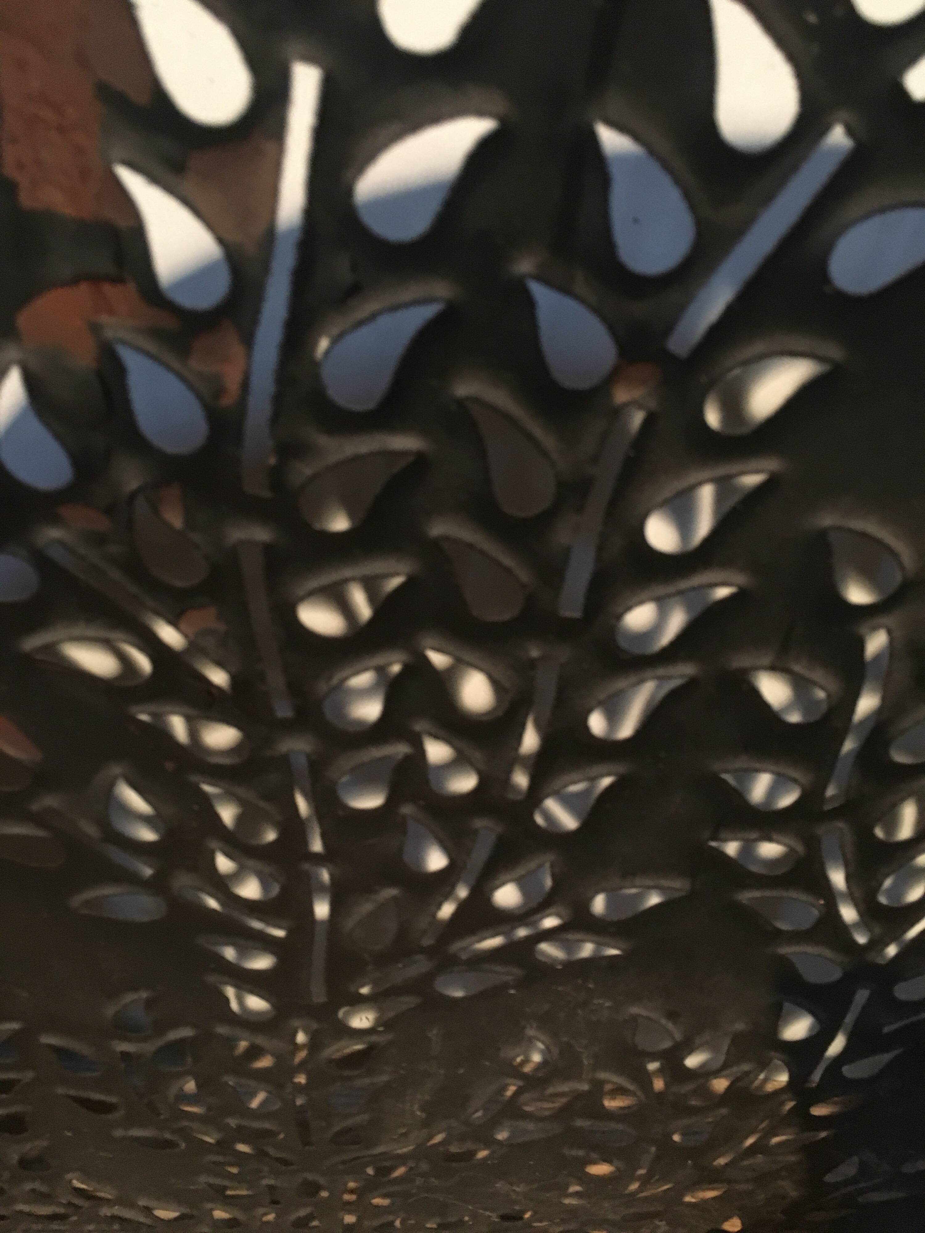 Wrought and cut metal fire screen
